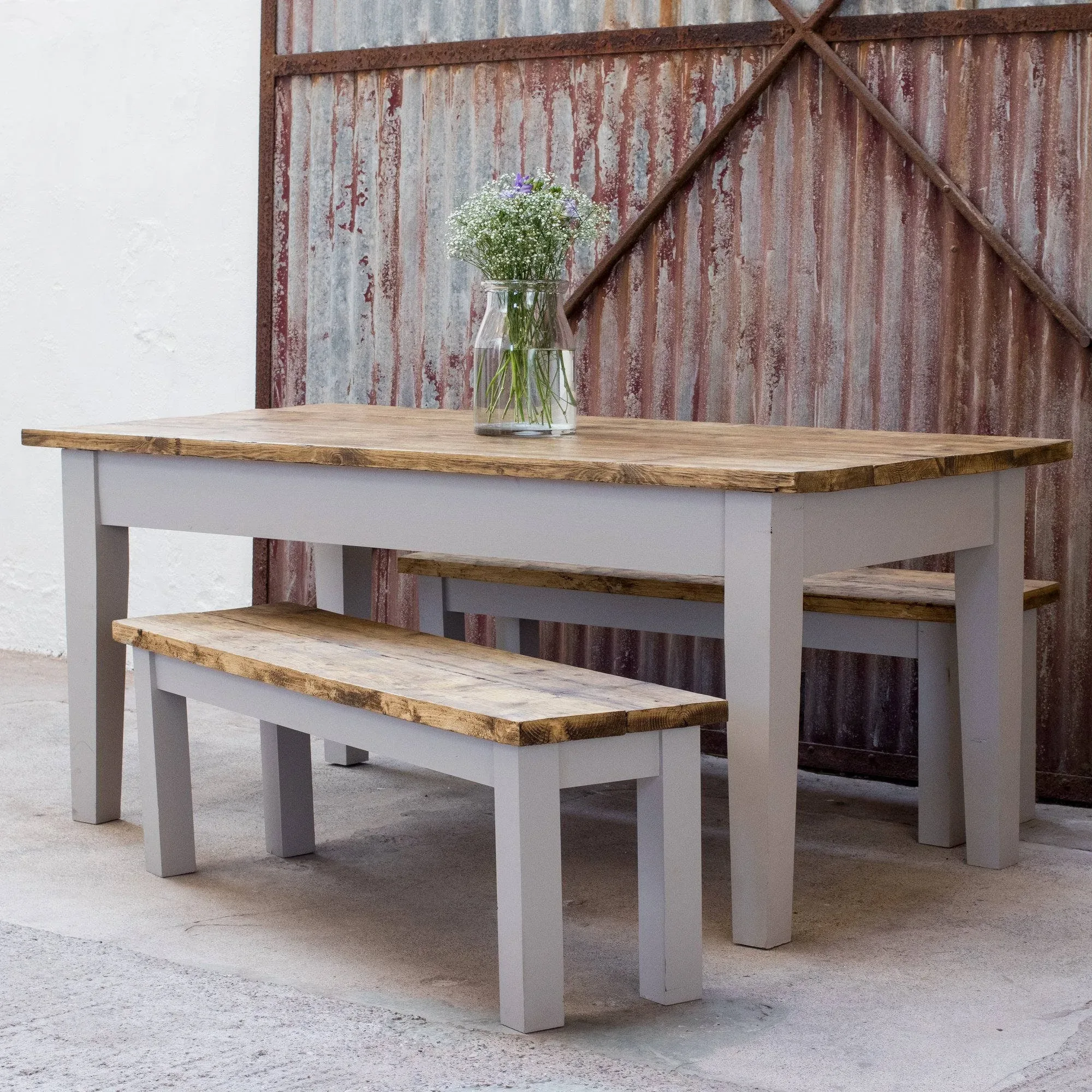 Solid wood bench tucked under a handmade dining table